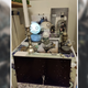 A Nier shrine appears full of Emil's face, along with other accessories.